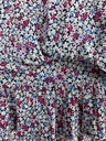 BLUSA CORTA, MANGA CORTA OLANES EN MANGAS Y CINTURA, DETALLE DE FLORES