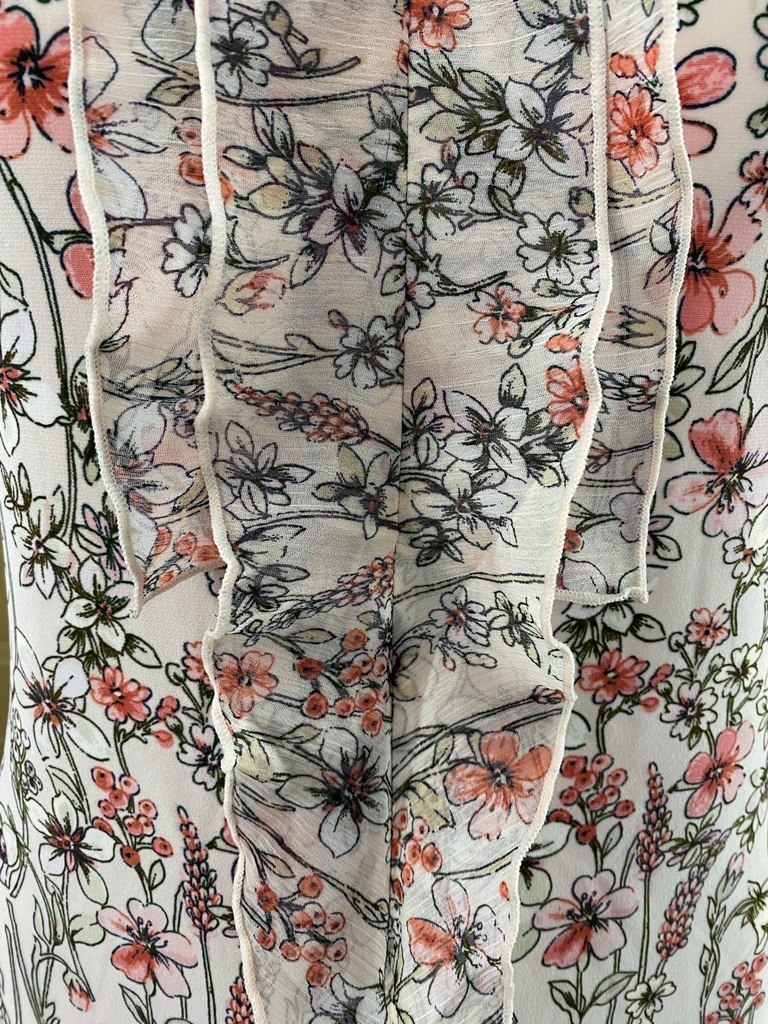 BLUSA ESTAMPADA FLORES CON OLANES