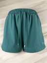 SHORT VERDE CON CIERRE EN BOLSAS