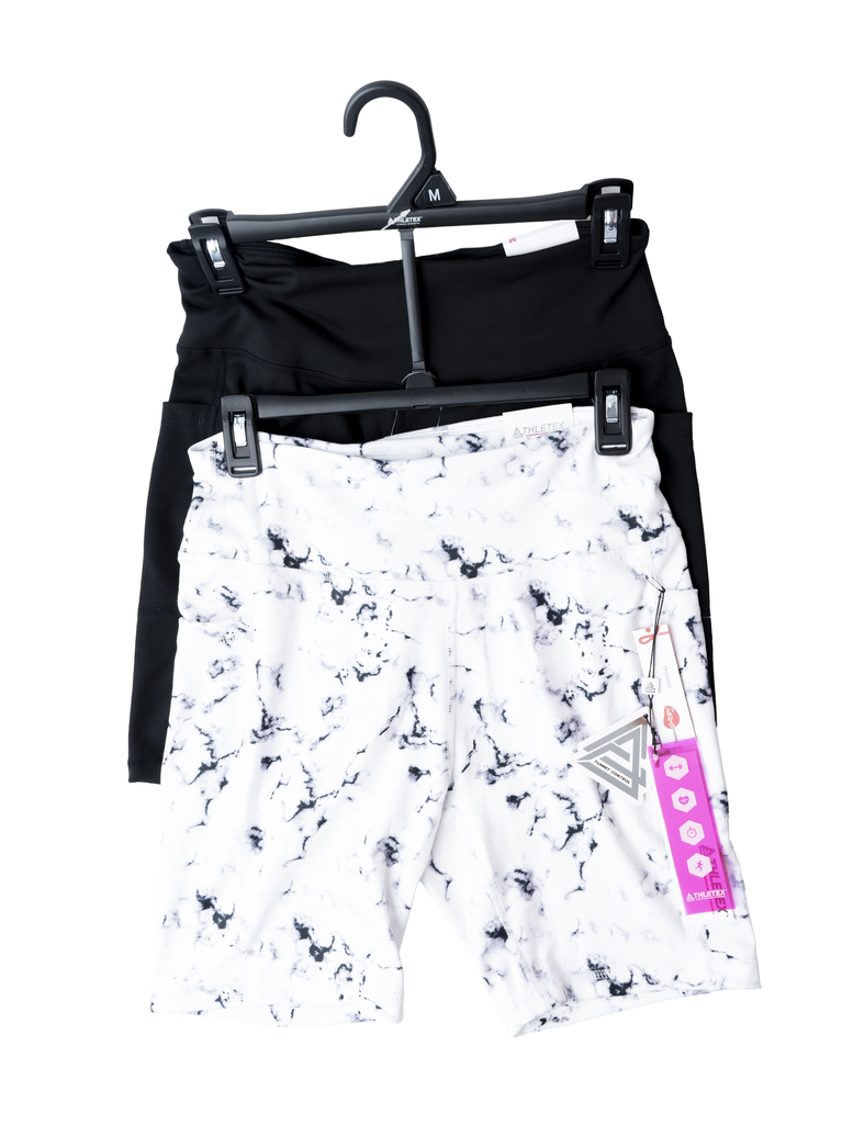 SHORT DEPORTIVO MUJER BOLSAS EN LOS COSTADOS 